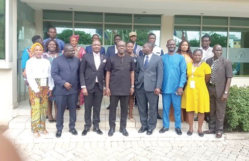 Kwadwo Oppong Nkrumah (4th from left), Minister of Information; Albert Dwumfour (2nd from left), GJA President; Timothy Melaye (3rd from left), Head of Communications of GIABA, and Kofi Boakye (5th from left), Deputy CEO of the Ghana Financial Intelligence Centre, and other participants