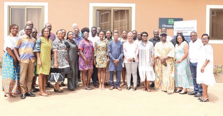 Participants and facilitators in a group photograph