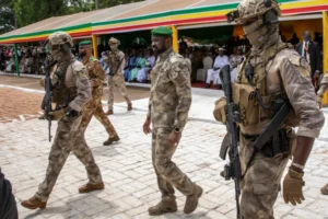 Leader of Mali's military government, Lieutenant Colonel Assimi Goita, centre, attends an independence day military parade in Bamako, Mali on September 22, 2022