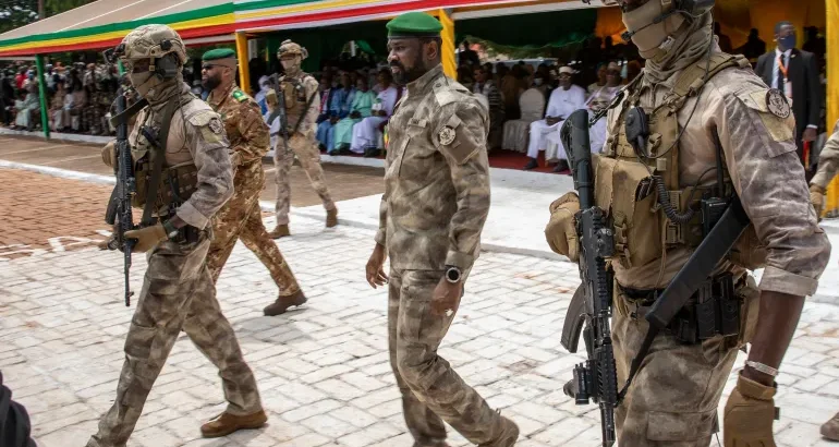 Leader of Mali's military government, Lieutenant Colonel Assimi Goita, centre, attends an independence day military parade in Bamako, Mali on September 22, 2022