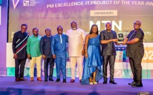 Paschal-Paaga-IT-Projects-Implementation-Manager-receiving-IT-Project-of-the-Year-Award-at-the-event