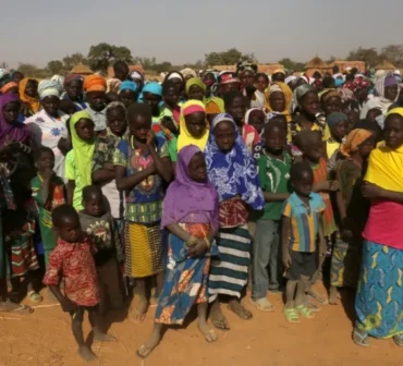 Displaced people wait for help at a village in Dablo area, Burkina Faso