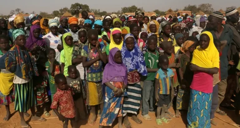 Displaced people wait for help at a village in Dablo area, Burkina Faso