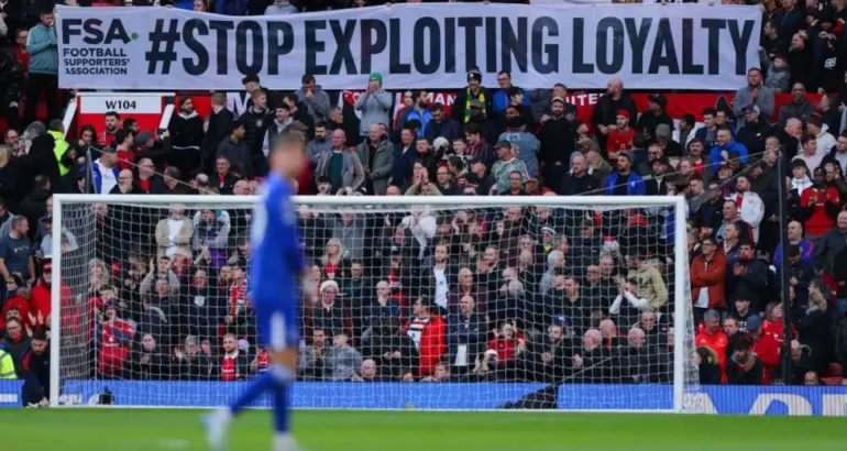 Manchester United fans protest against rising ticket prices at Old Trafford