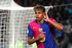 Lamine Yamal of Barcelona celebrates after assisting Robert Lewandowski (not pictured) for his side's fourth goal during the first Copa del Rey